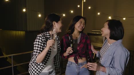 asian-ladies-toasting-wine-on-barbecue-party