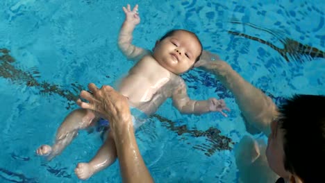 Baby-learning-to-swim