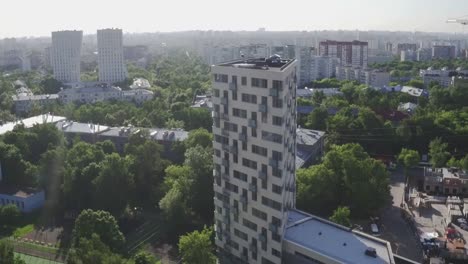 Aerial-view-of-apartment-building.-Development-infrastructure-city-for-big-population,-modern-skyscrapers-and-tall-edifices-of-megapolis,-urban-transportation-system.