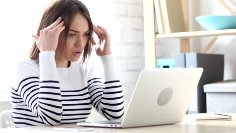 Woman-Reacting-to-Online-Loss-on-Laptop