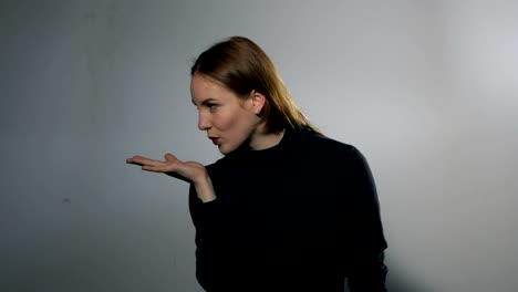 Portrait-of-a-Female-Model:-Blowing-Kisses-and-Middle-Finger-From-Profile