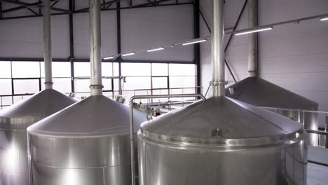 Row-of-tanks-in-brewery.