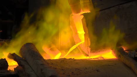 Metallurgical-production.-The-molten-metal-is-pouring-from-the-furnace,-the-hot-liquid-is-very-dangerous