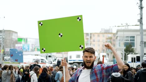 Man-at-political-meeting-with-banner-with-points-for-tracking-to-copy-space-text