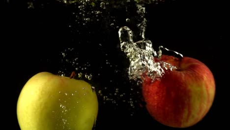 Falling-of-apples-in-water.-Slow-motion.