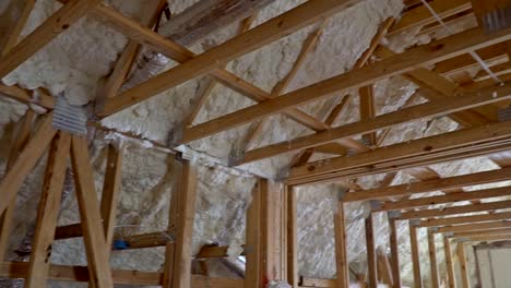 Closeup-on-termal-insulation-installing-at-the-attic-insulation-of-the-house