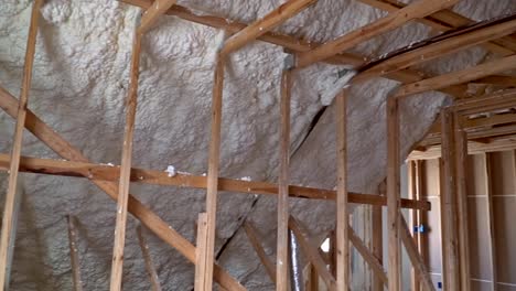 Closeup-on-termal-insulation-installing-at-the-attic-insulation-of-the-house