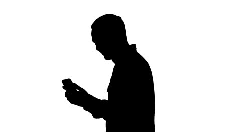 Silhouette-Portrait-of-successful-handsome-young-man-video-chating