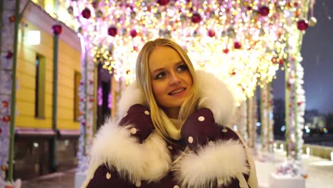 Moscow,-Russia.-Young-beautiful-girl-is-walking-on-the-night-decorated-winter-street