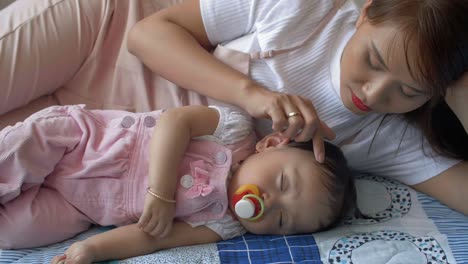 Mother-Watching-Her-Baby-Sleeping