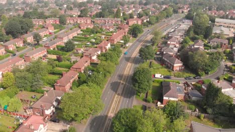 Aerial-footage-of-the-British-UK-town-of-Cookridge-/-Tinshill-just-outside-the-Leeds-City-Centre-area-in-West-Yorkshire-on-a-bright-sunny-day,-showing-a-typical-British-housing-estate.