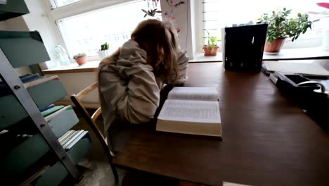 Crazy-woman-sitting-at-the-table.