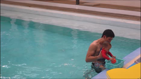 Father-and-Son-in-Swimming-Pool