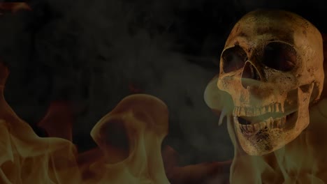 Human-skull-in-fire-and-smoke-on-black-background.