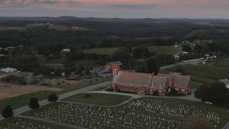 Slow-Aerial-Orbit-Around-Pennsylvanian-Church-at-Sunset