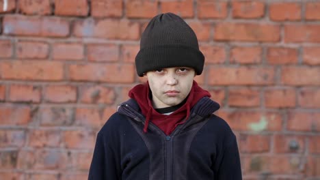 dramatic-portrait-of-a-little-homeless-boy