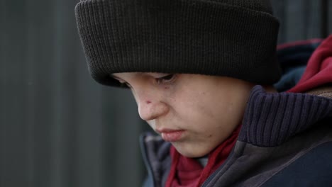 dramatic-portrait-of-a-little-homeless-boy