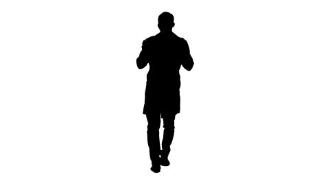 Silhouette-Cheerful-doctor-walking,-talking-and-looking-into-the-camera