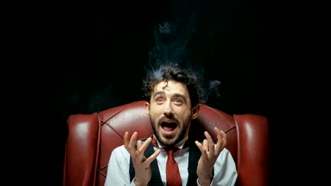 Portrait-young-stressed-man-screaming-frustrated-overwhelmed-steam-coming-out-up-of-head-isolated-on-black-background.