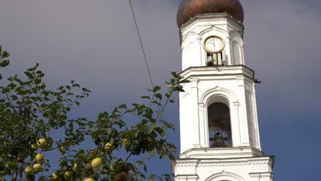 Apple-tree-in-front-of-Raif-monastery-bell-tower.-Bell-tower-Church-of-Archangel-Michael