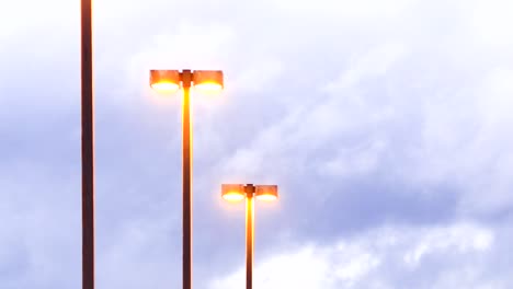 Parking-lot-lights-and-dark-clouds---time-lapse