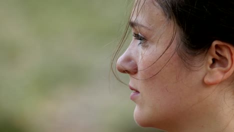 Sad-Depressed-young-Woman's-Profile-Crying--Outdoor