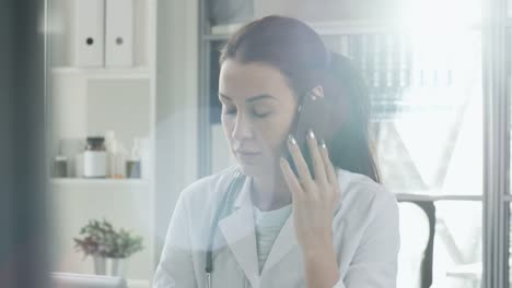 Researcher-Talking-on-Phone-at-Work-in-Laboratory