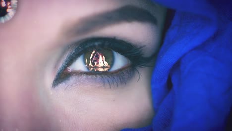 4K-Close-up-of-Woman-Robot-Eye-with-Fire-Animation