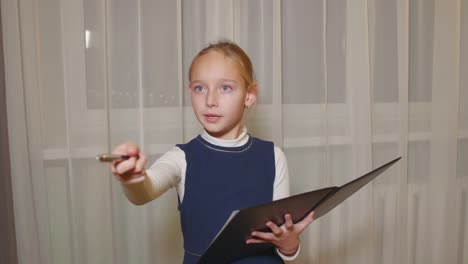 Young-business-girl-talking-with-someone-and-pointing-of-hands-with-pen