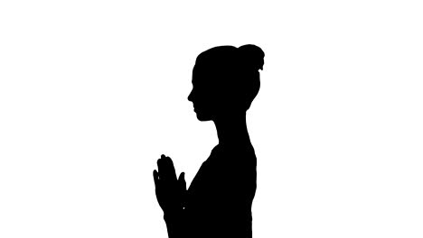 Silhouette-Young-woman-practicing-yoga