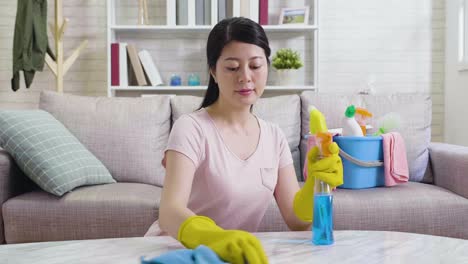 japanese-housewife-using-rag-polishing-table