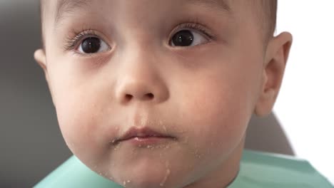 Inquisitive-Asian-Baby-Looking-Around-at-Mealtime