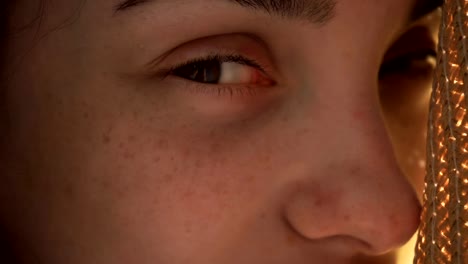 the-eyes-of-a-young-girl-with-freckles-on-her-face-close-up