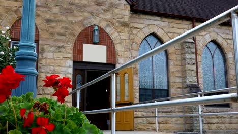 A-typical-daytime-establishing-shot-of-church-or-chapel-entrance-with-open-door