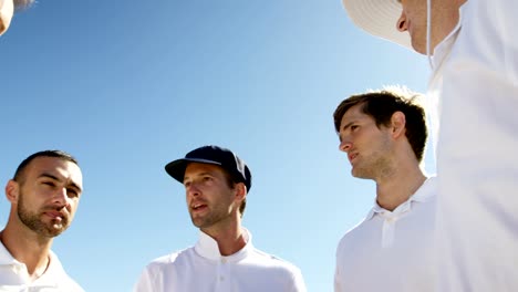 Cricket-players-into-team-discussion-during-cricket-match