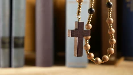 Wooden-Rosary-Hanging-in-Front-of-Library.-No-Movement-Camera.