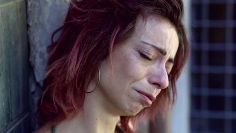 Sad-Desperate-young-Woman-Crying-Alone--outdoor