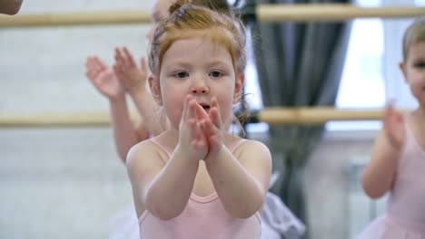 Adorable-Little-Girl-Clapping-Hands