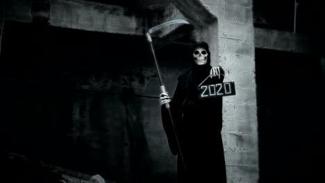 death-with-a-scythe-raises-a-sign-with-the-inscription-2020