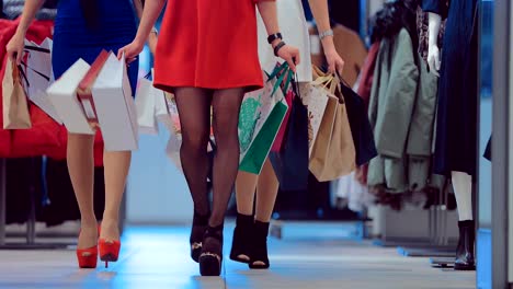 Shopaholic-female-legs-with-shopping-bags