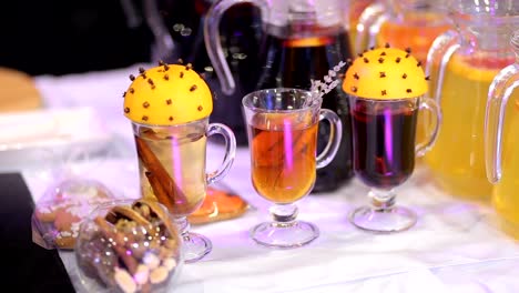 Cups-of-mulled-wine-with-slice-of-orange-and-cinnamon.-Christmas-mood