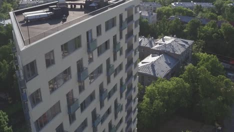 Aerial-view-of-Just-finished-modern-large-apartment-building-at-summer.-Concept-for-business-and-modern-life.-Residential-building