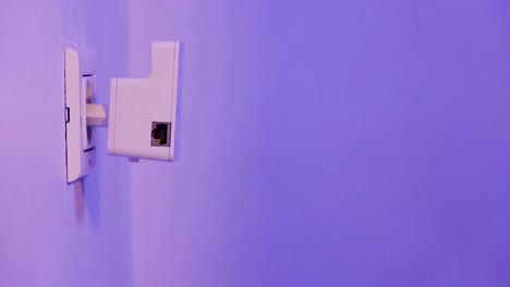 WiFi-repeater-in-electrical-socket-on-the-wall