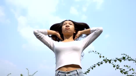 Slow-motion-of-Asian-woman-with-hair-motion.