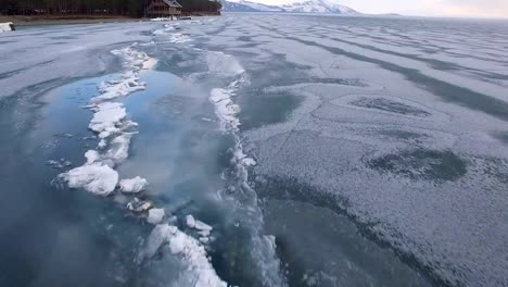 Flying-over-iced-sea-or-ocean-by-helicopter-.