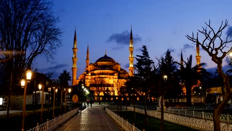 People-walking-near-Blue-mosque-of-Istanbul-at-evening-time