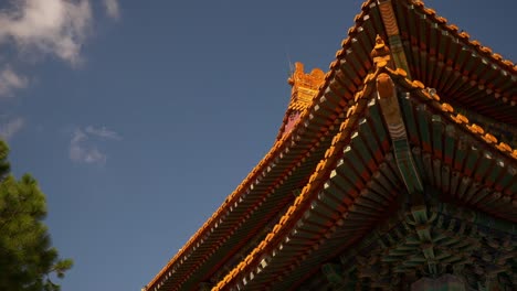 sunny-day-zhuhai-park-temple-rooftop-front-slow-motion-up-view-4k-china