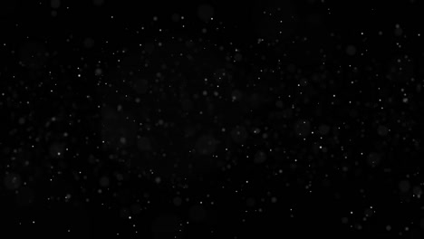 Abstrakte-weiße-Partikel-Motion-auf-schwarzem-Hintergrund