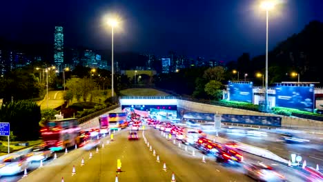 Busy-Traffic-Going-Into-Tunnel-at-Night.-4k-Tight-Still-Shot.