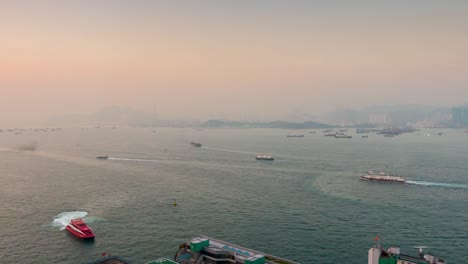 China-Sonnenuntergang-Licht-Hongkong-Victoria-Hafen-Verkehr-Stadtpanorama-4k-Zeitraffer